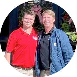 Skip and Kyle Russell standing outside a Newk’s eatery